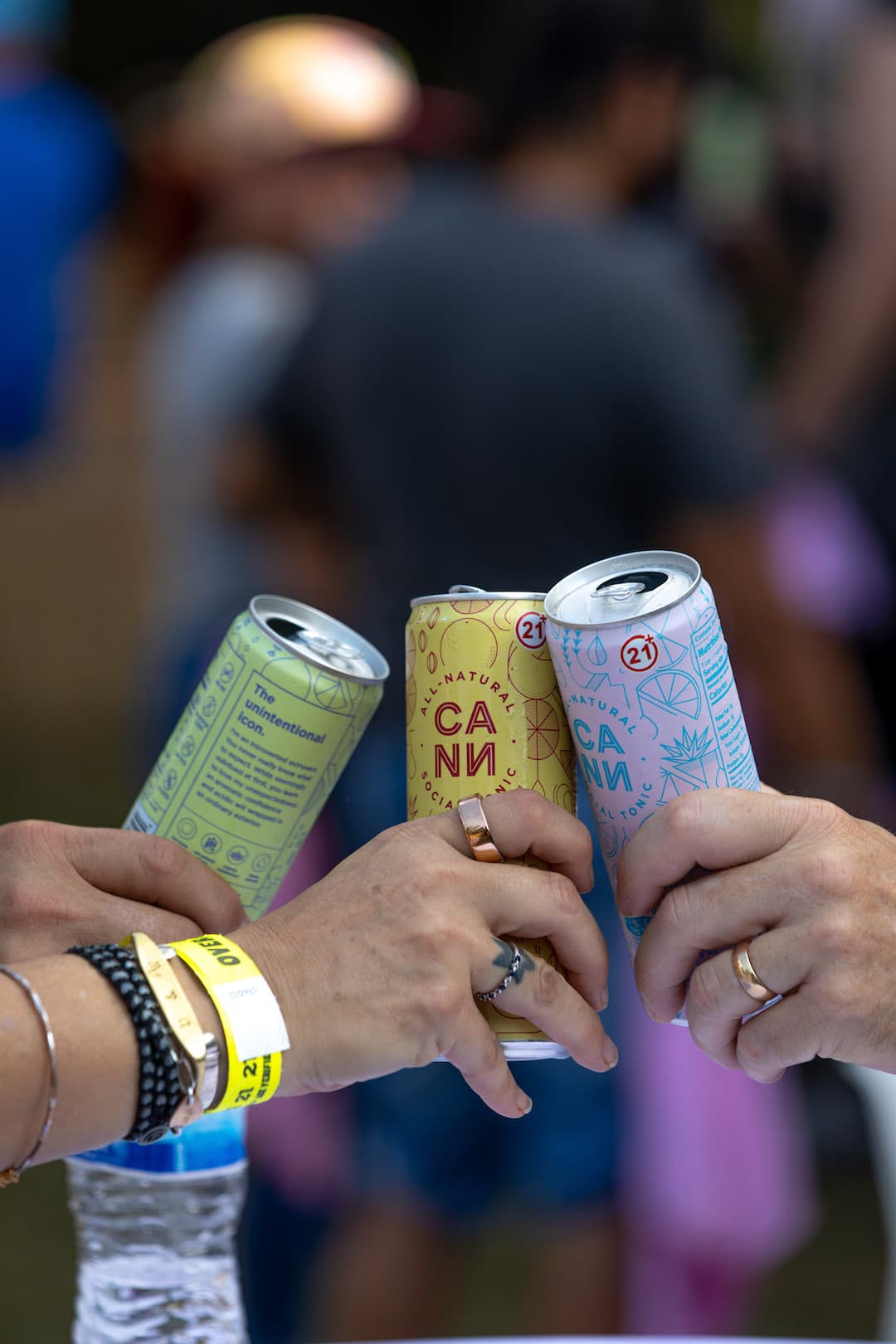 Group of friends holding Cann Hi Boy products