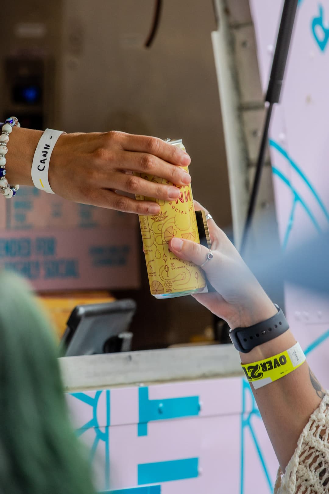 Group of friends holding Cann Hi Boy products